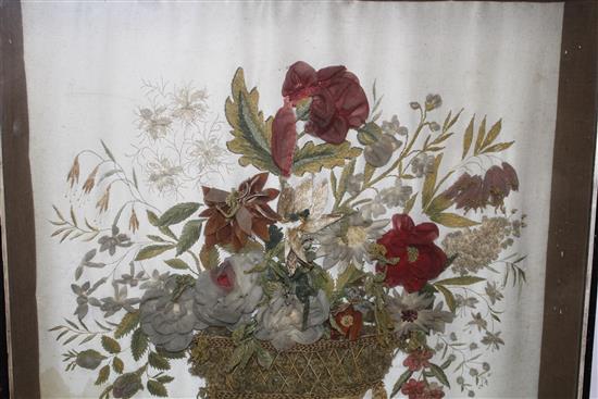 An early Victorian silk and woolwork panel depicting flowers in a basket, 60 x 51cm